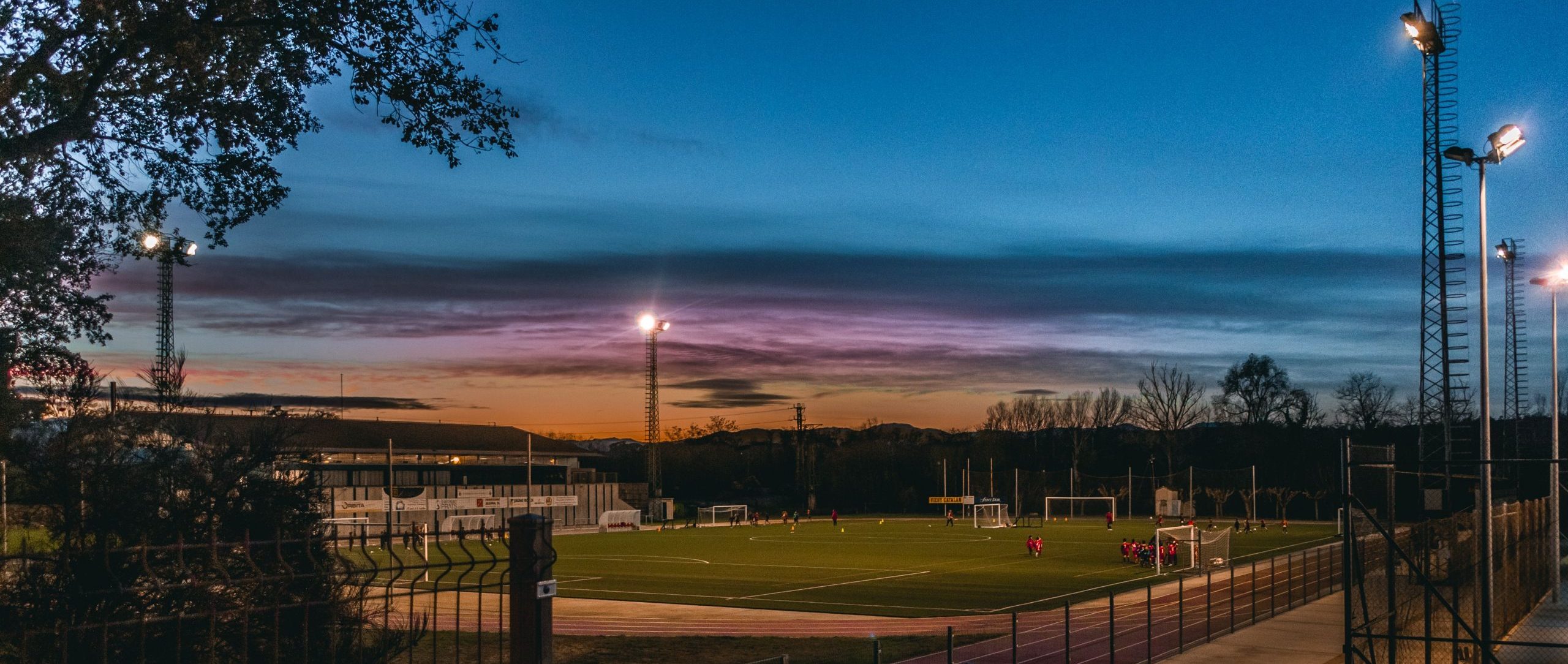 A local football club with players training at night