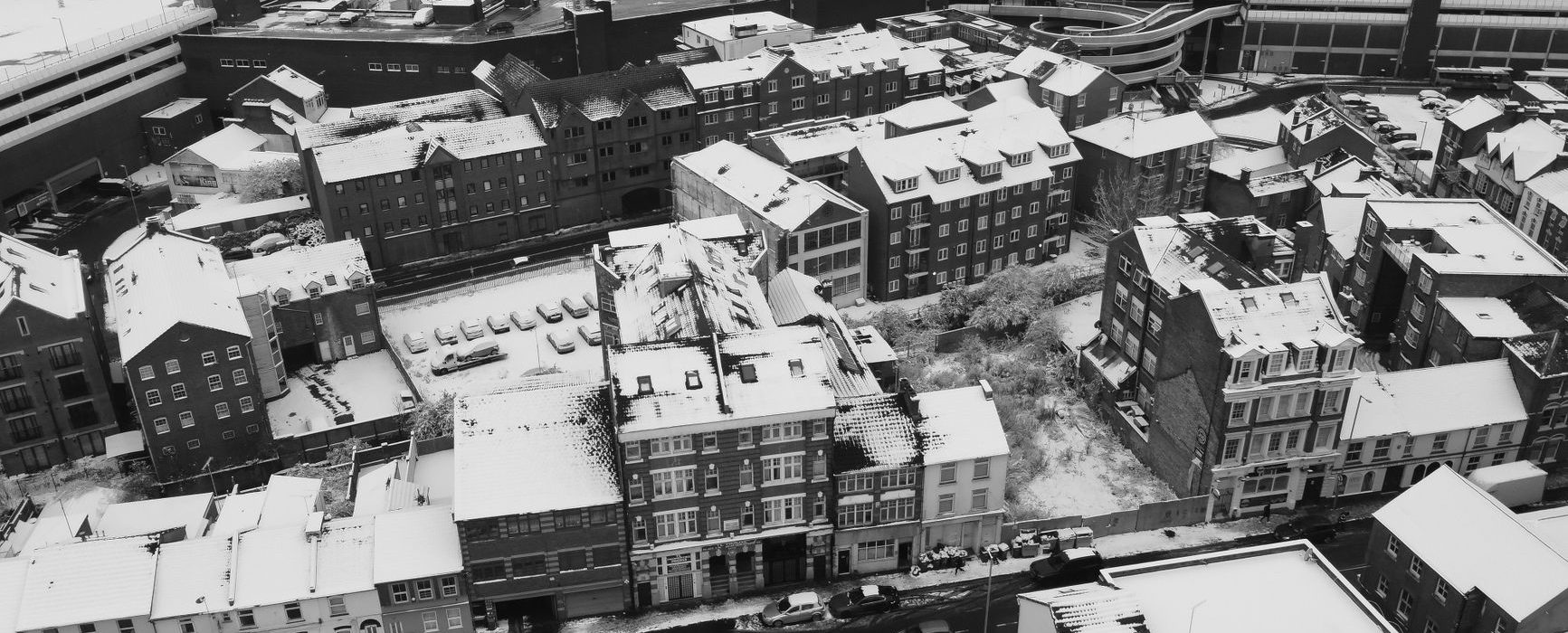 aerial view of snow covered buidlngs