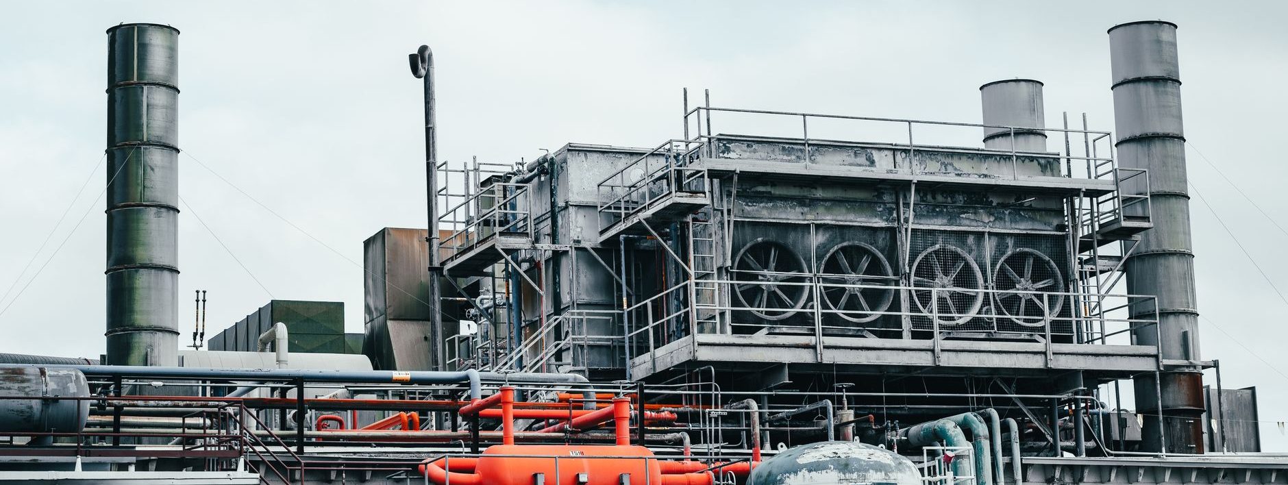 factory with tall metal pipes